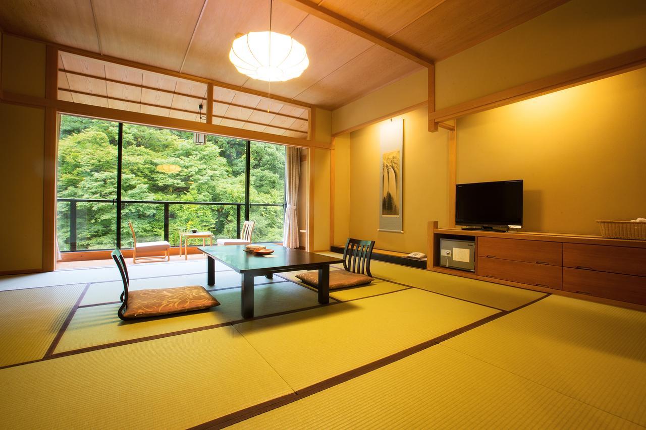 Отель Osawa Onsen Sansuikaku Ханамаки Номер фото