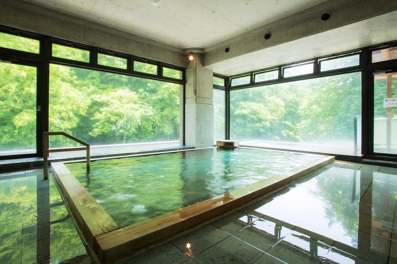 Отель Osawa Onsen Sansuikaku Ханамаки Экстерьер фото