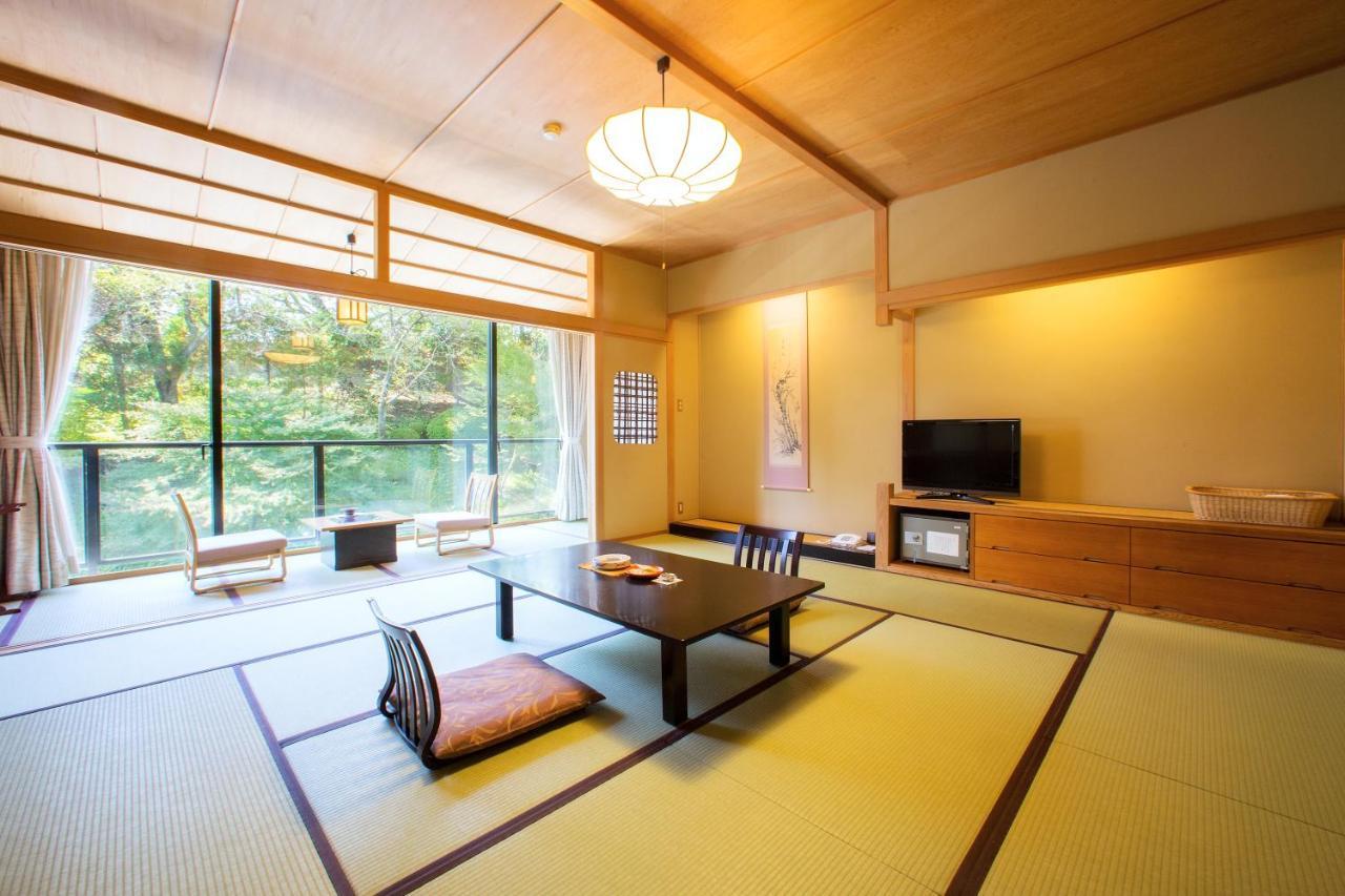 Отель Osawa Onsen Sansuikaku Ханамаки Экстерьер фото