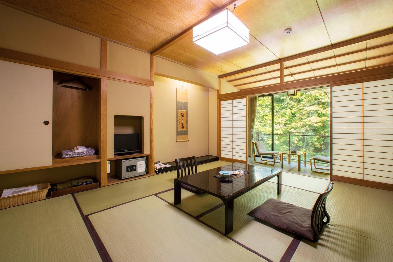 Отель Osawa Onsen Sansuikaku Ханамаки Экстерьер фото