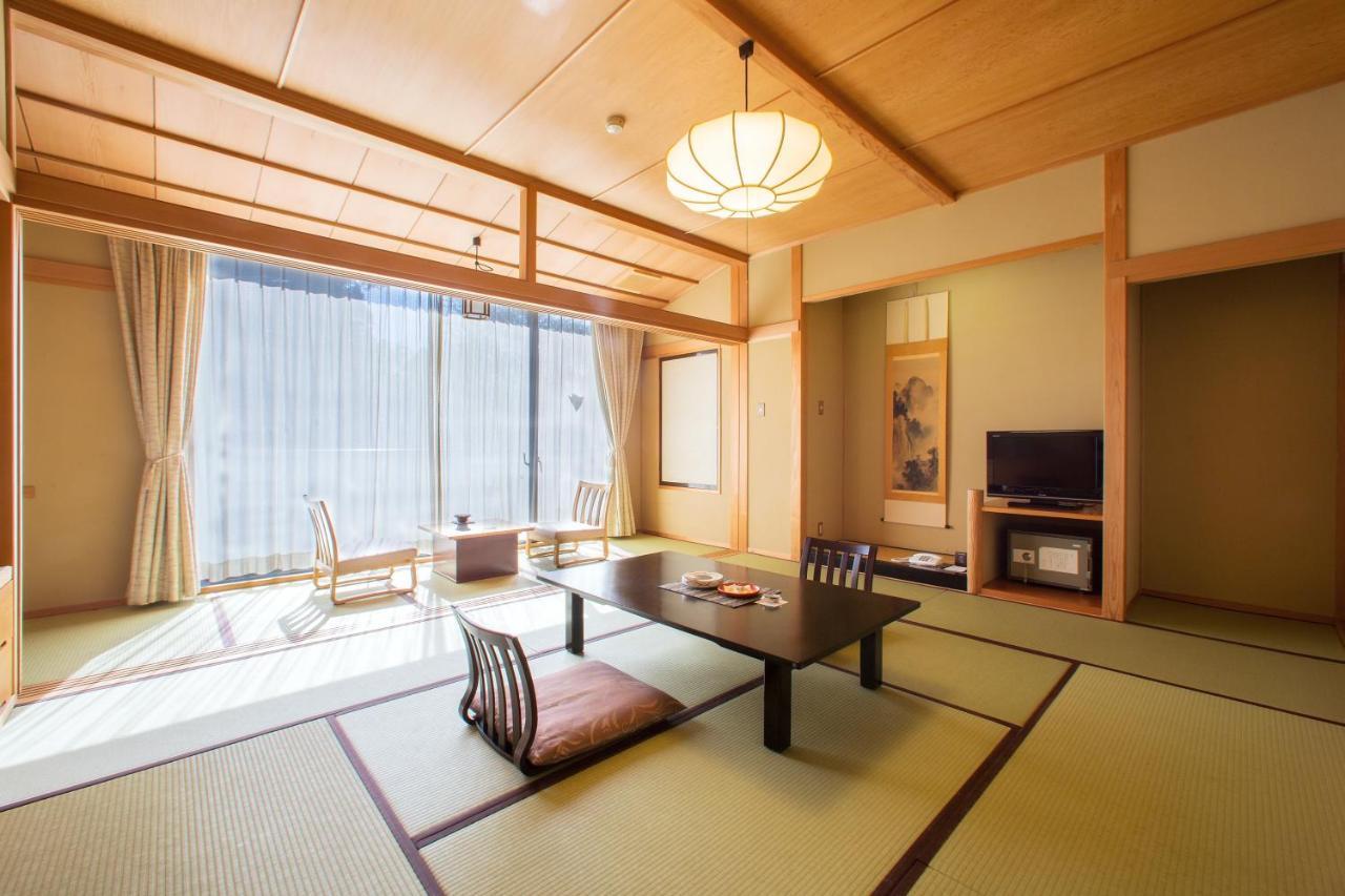 Отель Osawa Onsen Sansuikaku Ханамаки Экстерьер фото