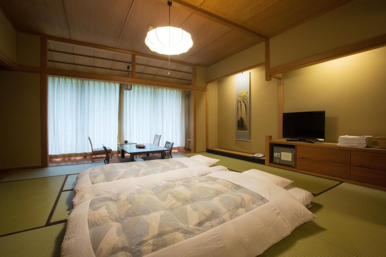 Отель Osawa Onsen Sansuikaku Ханамаки Номер фото