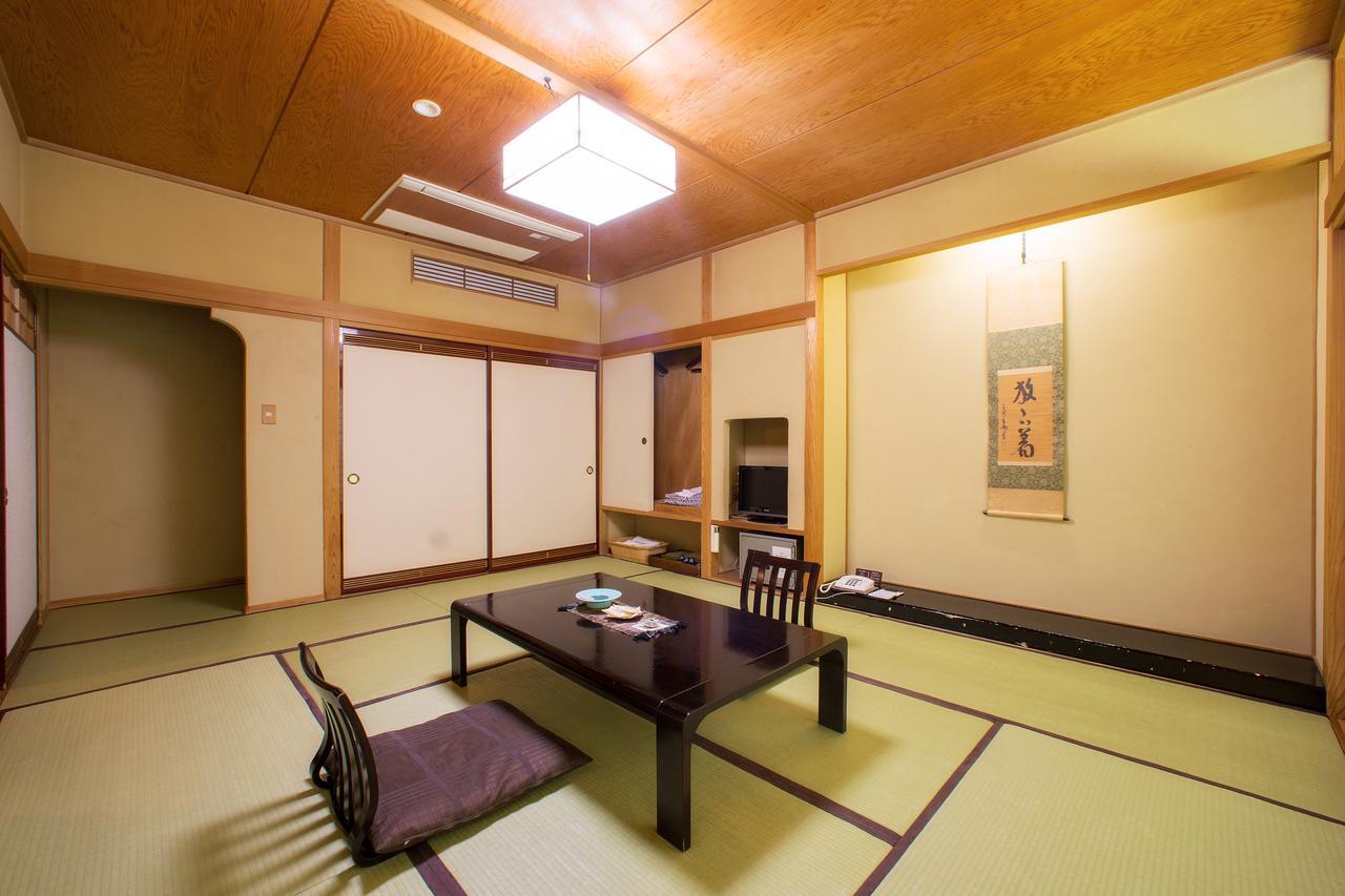 Отель Osawa Onsen Sansuikaku Ханамаки Экстерьер фото