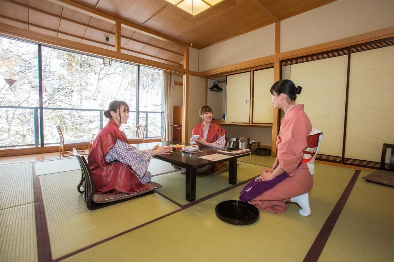 Отель Osawa Onsen Sansuikaku Ханамаки Экстерьер фото